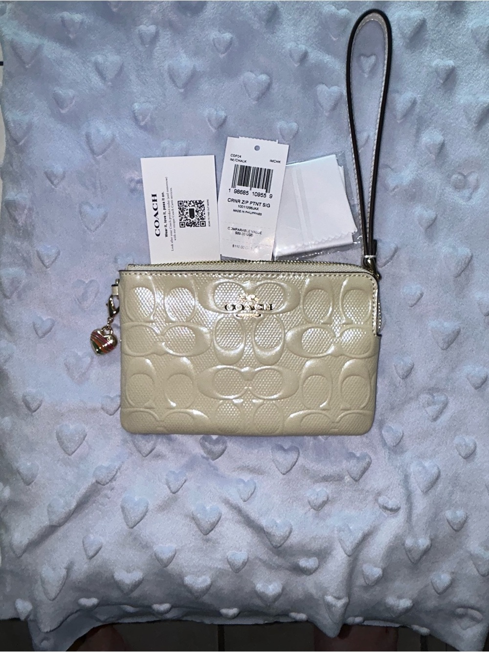Coach Cream Embossed Signature Wristlet Clutch with Charm